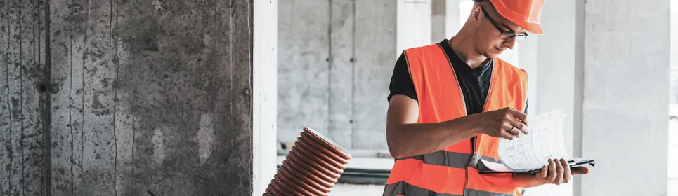 project manager going over expense report at the construction site
